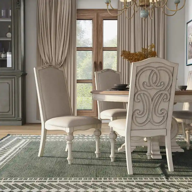Caelum 7-Piece Round Dining Set with White Fabric Upholstery by The Gray Barn
