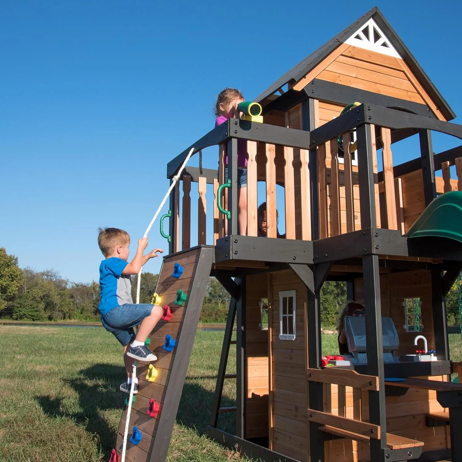Backyard Discovery Canyon Creek Cedar Wood Swing Set with Wave Slide, Clubhouse, Play Kitchen, Picnic Area, Swings and Rock Wall